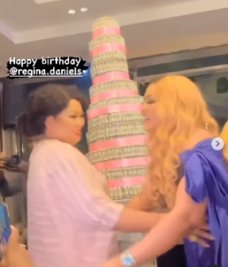 Emotional Moment Rita Daniels Gifted Her Daughter, Regina Daniels Huge Dollar Cake (Video)