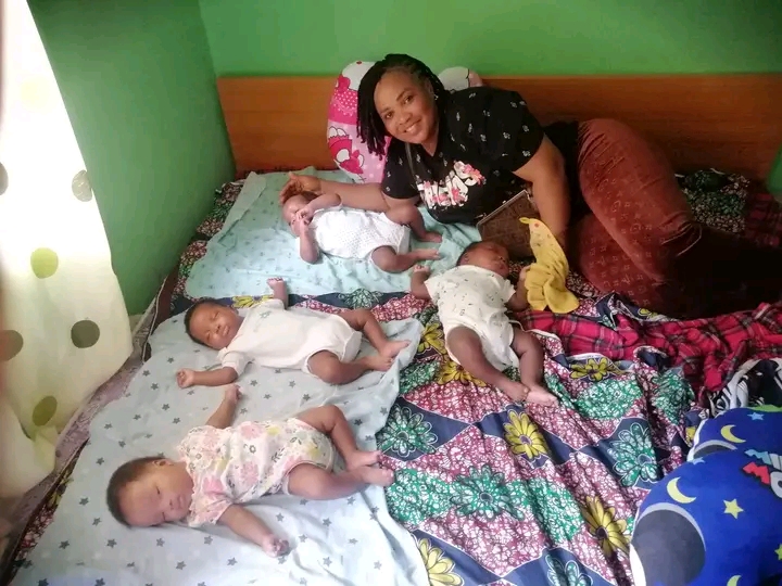 "Miracle no dey tire Jesus" Nigerian woman celebrates as she welcomes quadruplets after 9 years of waiting